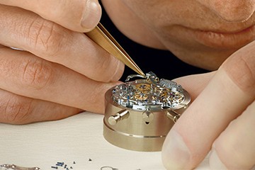 欧米茄名表不走维修